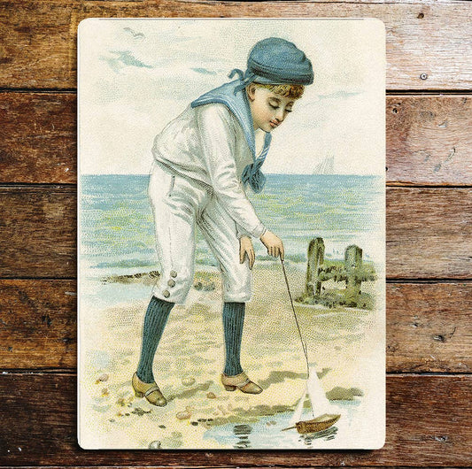 Vintage Seaside Boy Playing Sailing Boat | Metal Sign plaque